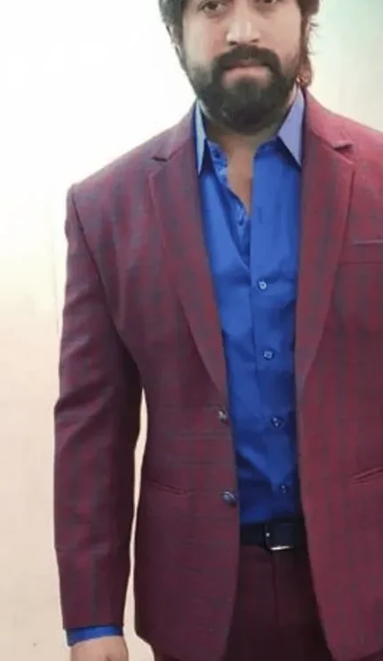 Rocking Star Yash wearing a maroon checked bespoke blazer and matching trousers tailored by Arsu